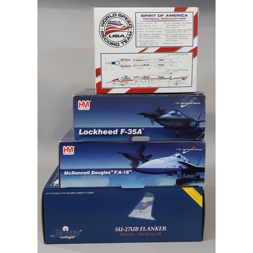 1748 - 4 boxed models  of aircraft and a jet car comprising 1:72 scale SU-27UB Flanker Russia Airforce 58, ... 