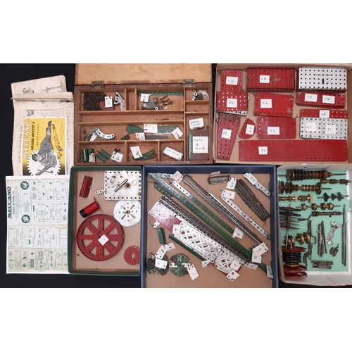 1757 - A collection of 1940s - 50s Meccano, sorted and labelled including a clockwork motor, hub disks, gir... 