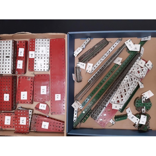 1757 - A collection of 1940s - 50s Meccano, sorted and labelled including a clockwork motor, hub disks, gir... 