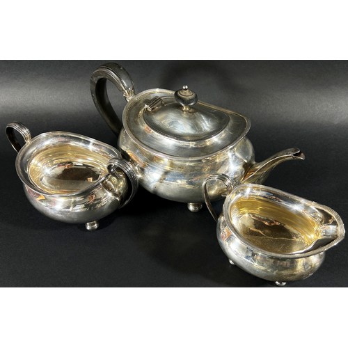 176 - A three piece silver tea service, Sheffield 1925 and an earlier sugar bowl, 1915, both made by Atkin... 