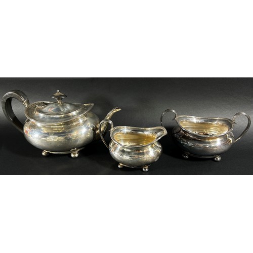 176 - A three piece silver tea service, Sheffield 1925 and an earlier sugar bowl, 1915, both made by Atkin... 