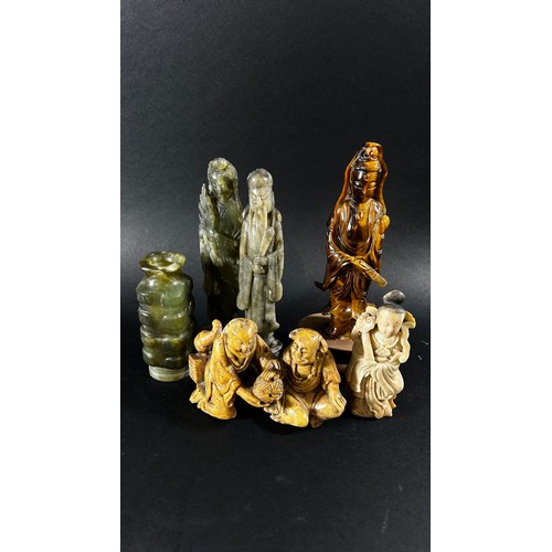 211 - A collection of archaistic style Chinese carved jadeite / hardstone to include a zoomorphic libation... 