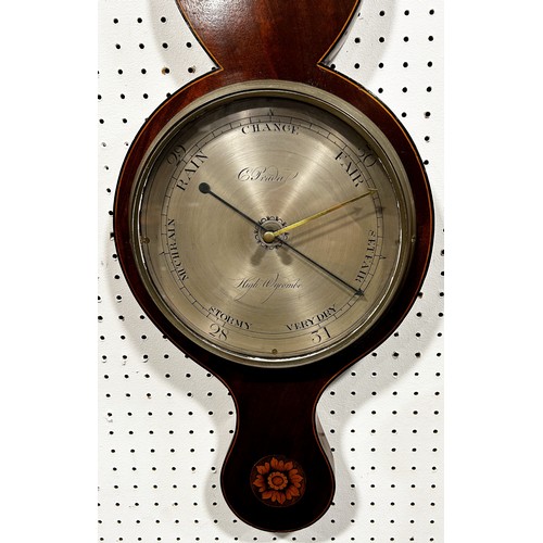 458 - A Georgian mahogany wheel barometer with string banded borders and silvered dials, by C Prada if Hig... 