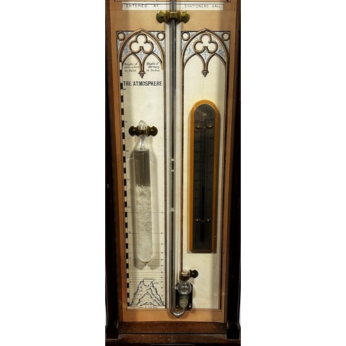 459 - An Admiral Fitzroy barometer, the printed back with Gothic tracery outline, set within a mahogany ca... 