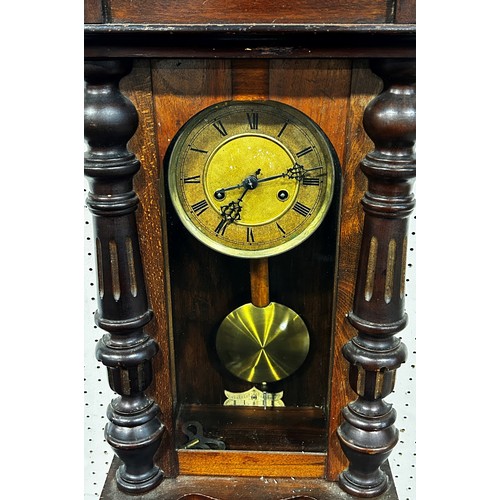 464 - A Edwardian wall clock, brass dial and eight day striking movement