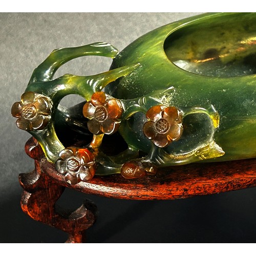 225 - A Chinese translucent spinach green bowenite jade brush washer, of peddle form carved with flowering... 