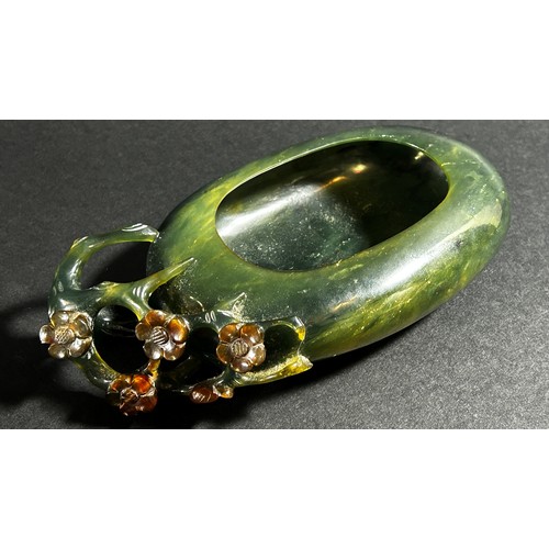 225 - A Chinese translucent spinach green bowenite jade brush washer, of peddle form carved with flowering... 