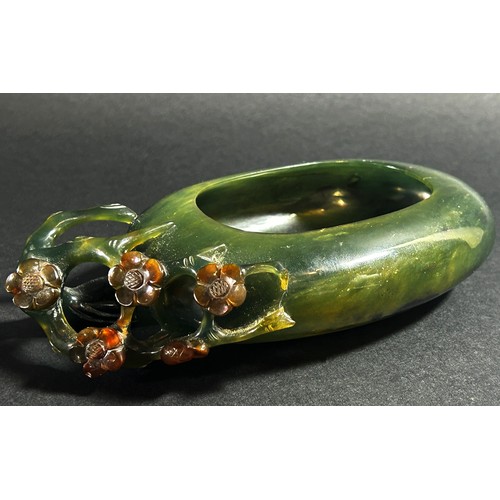 225 - A Chinese translucent spinach green bowenite jade brush washer, of peddle form carved with flowering... 