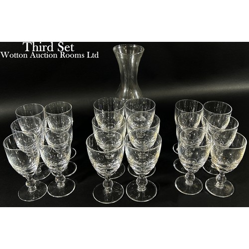 143 - A wine carafe together with six red wine glasses, six white wine glasses and six cordial glasses (18... 