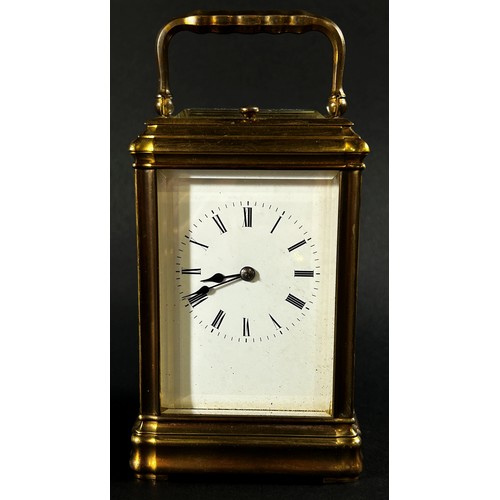 448 - A 19th century brass carriage clock with enamelled dial, with eight day striking movement, currently... 