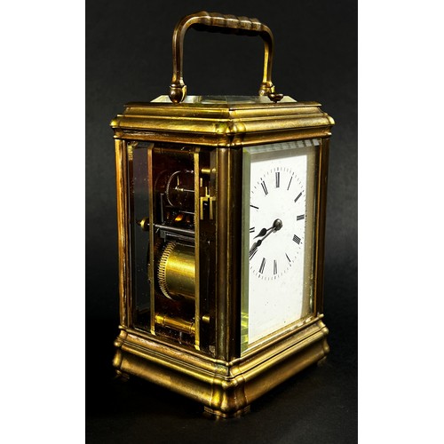 448 - A 19th century brass carriage clock with enamelled dial, with eight day striking movement, currently... 