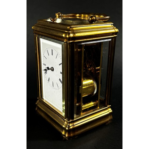 448 - A 19th century brass carriage clock with enamelled dial, with eight day striking movement, currently... 