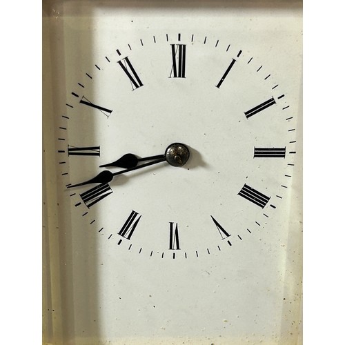 448 - A 19th century brass carriage clock with enamelled dial, with eight day striking movement, currently... 