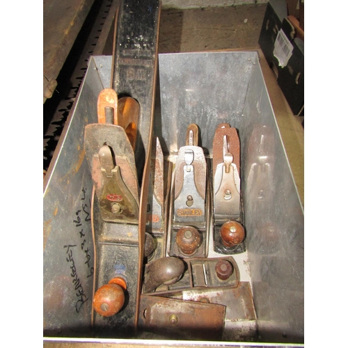 1100 - A collection of old Stanley and other planes, numerous drill set squares and other vintage woodworki... 