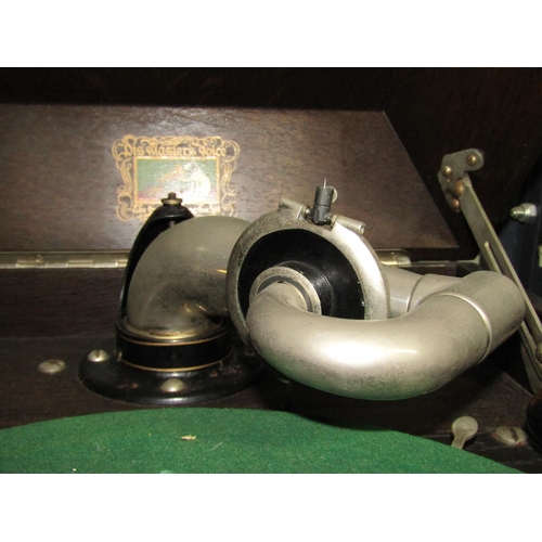 1110 - Two vintage table top  HMV windup gramophones in oak cabinets together with one other (3)