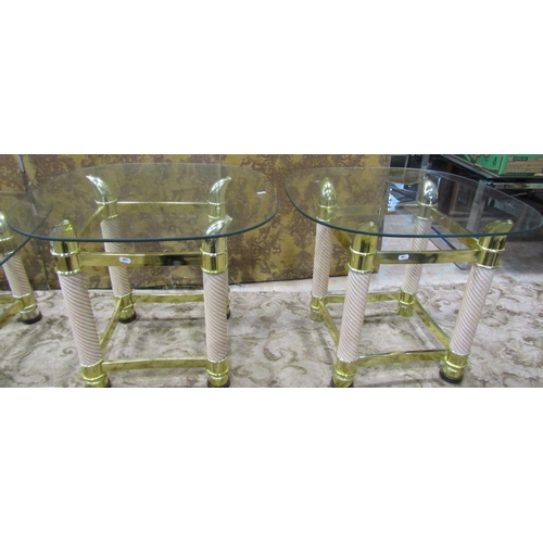 1124 - A set of three contemporary brass and timber occasional tables (a pair and one larger) all with oval... 