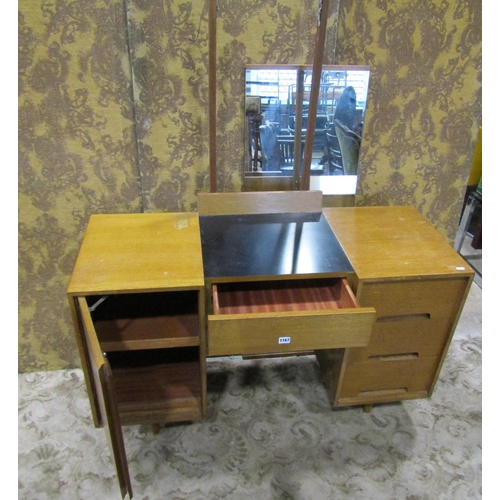 1167 - A vintage Stag oak dressing table and six drawers with raised mirror back and two further wall mirro... 