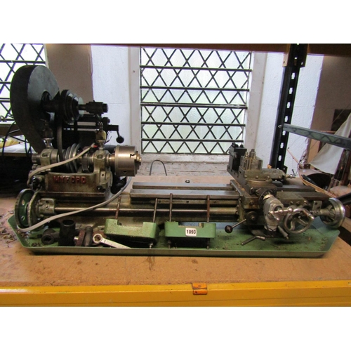 1093 - A vintage Myford lathe 109 cm length x 44 depth together with literature