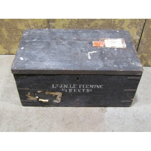 1096 - An Ex-military pine and steel banded travel trunk with stencil detail