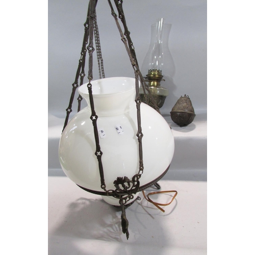 543 - A Victorian cast iron adjustable pendant oil lamp, with an electric conversion and opaque white shad... 