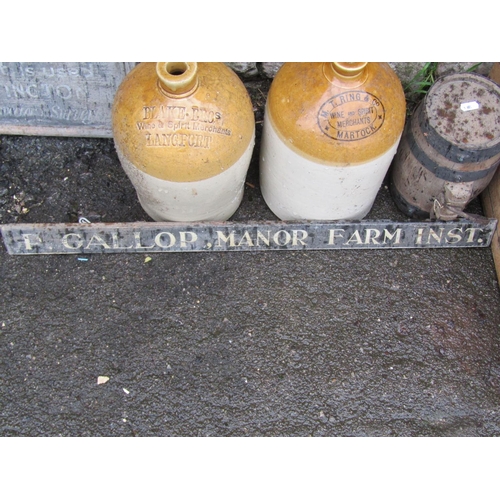 1069 - Two vintage stoneware flagons with impressed and printed merchants marks, 30 cm high, a vintage hand... 