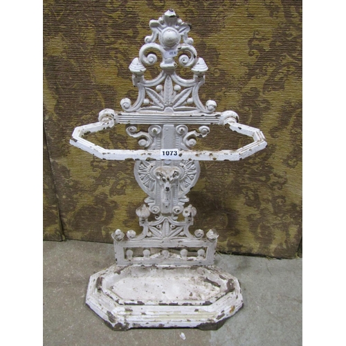 1073 - A Victorian iron stick stand with rams mask and geometric detail with drip tray and lozenge mark