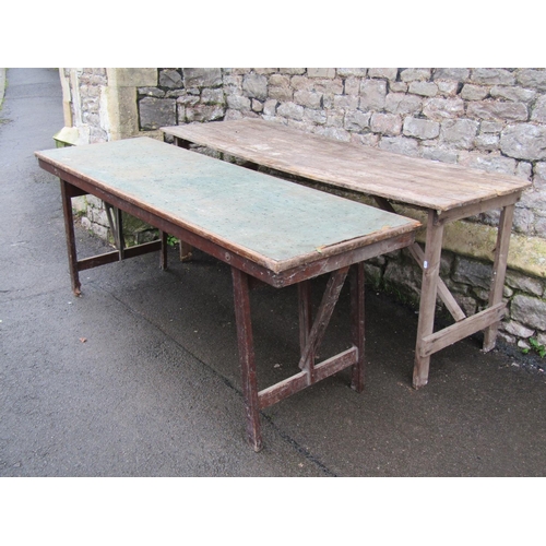 1076 - Two vintage folding trestle tables, one in pine with folding framework