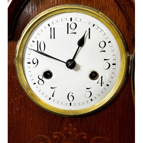 435 - Edwardian oak lancet shaped mantle clock, the case with marquetry inlay, with eight day striking mov... 