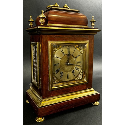 454 - A late 19th century Georgian style bracket clock, the rosewood case with applied brass detail, the d... 