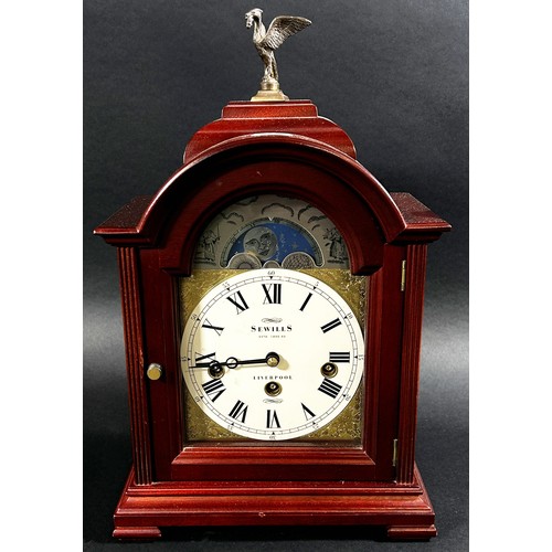 455 - A good quality reproduction bracket clock in the Georgian style by Sewills (Liverpool) the broken ar... 