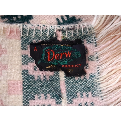 882 - A traditional woollen Welsh blanket of reversible double weave in pink, green, white and cream colou... 