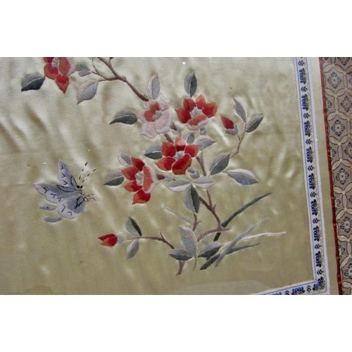 674 - Two 20th century Chinese silk embroideries, depicting floral sprays with ripe fruit and butterflies,... 