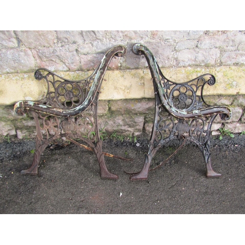 1022 - Two pairs of cast iron bench ends, with decorative pierced detail (4)