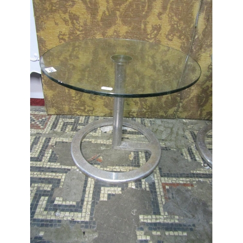 1134 - An associated pair of mid 20th century, chromium plated, occasional tables with plate, glass tops of... 