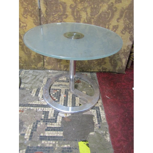 1134 - An associated pair of mid 20th century, chromium plated, occasional tables with plate, glass tops of... 