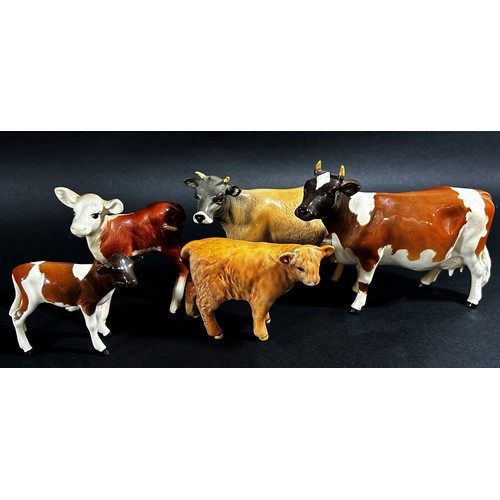 66 - A mixed Beswick group to include a sow, Jersey cow, Ayrshire cow, a deer, calves, etc (8)