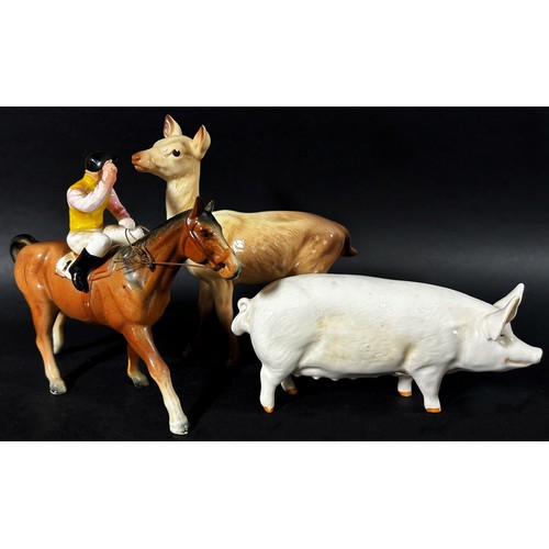 66 - A mixed Beswick group to include a sow, Jersey cow, Ayrshire cow, a deer, calves, etc (8)