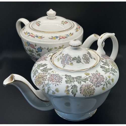 96 - A Bavarian porcelain tea and coffee service of octagonal form, with floral painted detail, together ... 