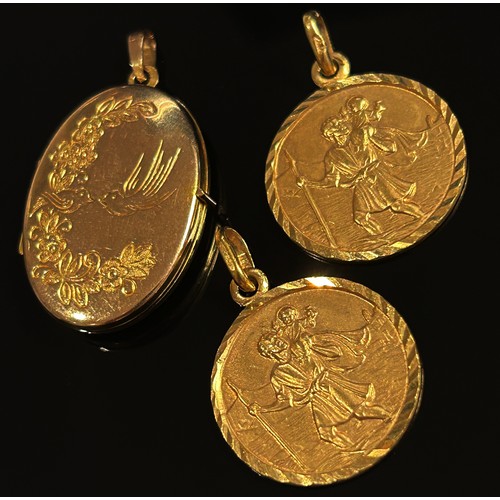 291 - Three 9ct pendants; two St Christopher examples and a locket with engraved decoration, 9.4g total (3... 