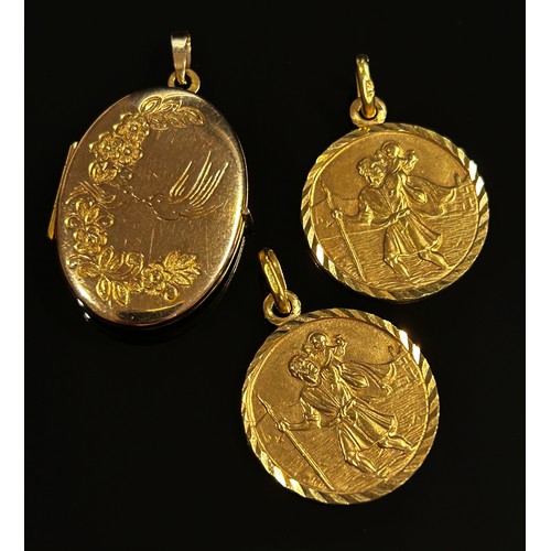 291 - Three 9ct pendants; two St Christopher examples and a locket with engraved decoration, 9.4g total (3... 