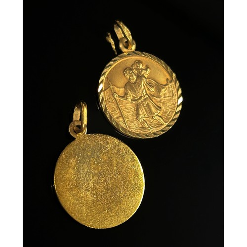 291 - Three 9ct pendants; two St Christopher examples and a locket with engraved decoration, 9.4g total (3... 