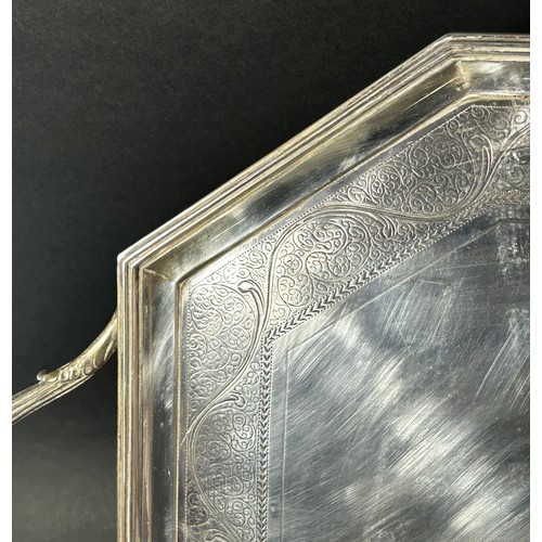 162 - A silver serving tray with side engravings and centre inscriptions reading 'Labore', London, dated 1... 