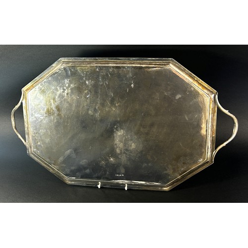 162 - A silver serving tray with side engravings and centre inscriptions reading 'Labore', London, dated 1... 