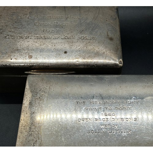 163 - A silver cigarette box engraved with inscriptions, together with a matching similar cigarette box (2... 