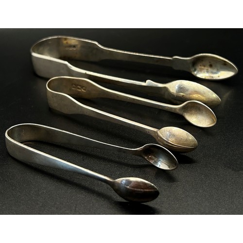 165 - A group of five silver sugar tongs in various designs, 6 ozs approximately