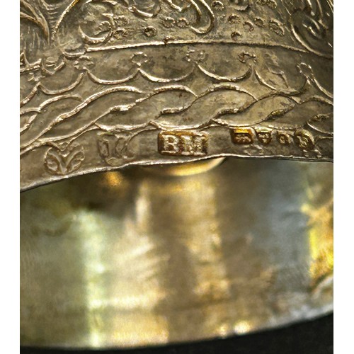 168 - A silver table bell in the form of a dancing woman, with English hallmarks, together with a miniatur... 