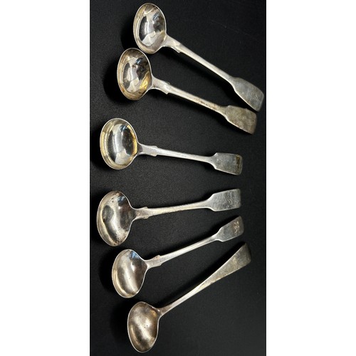 169 - A silver group of twelve mustard spoons in mixed designs, 4.8 ozs approximately