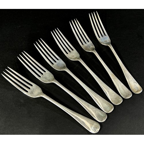 173 - A silver group of table and dessert forks, Sheffield with mixed hallmarks, 12 altogether, 21 ozs app... 