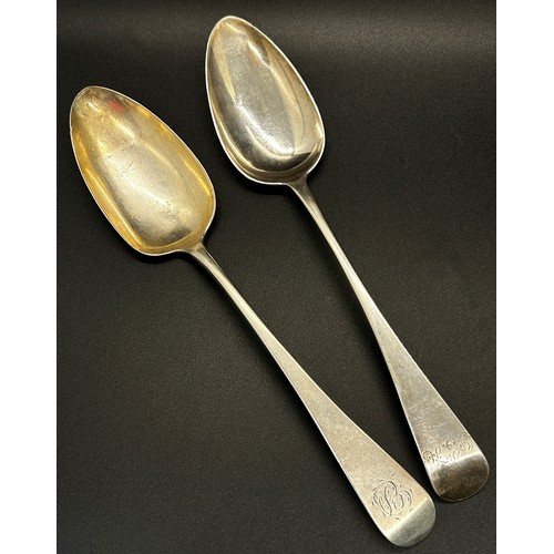 174 - Four silver dinner spoons with different designs and makers, 8 ozs approximately