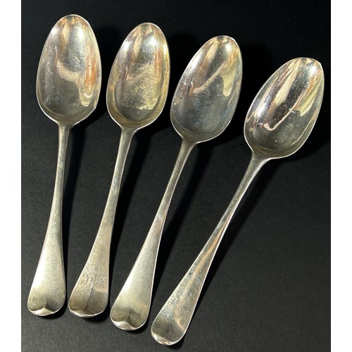 180 - A group of eight silver dinner spoons, mixed makers from London, 16.5 ozs approximatley